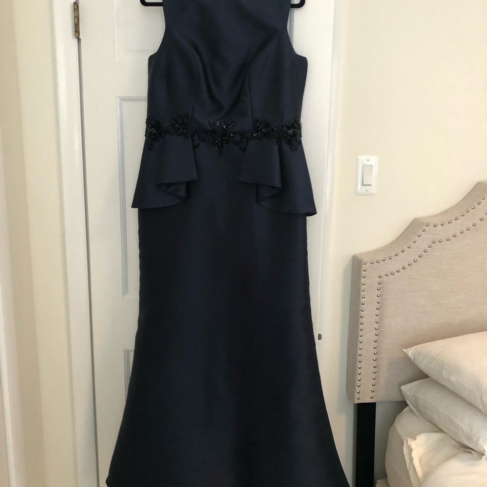 Mikado navy blue wedding gown . Size 12 beaded around waist.